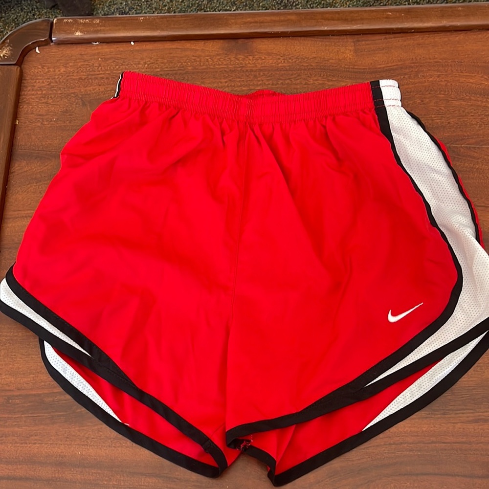 Red Nike dri-fit shorts